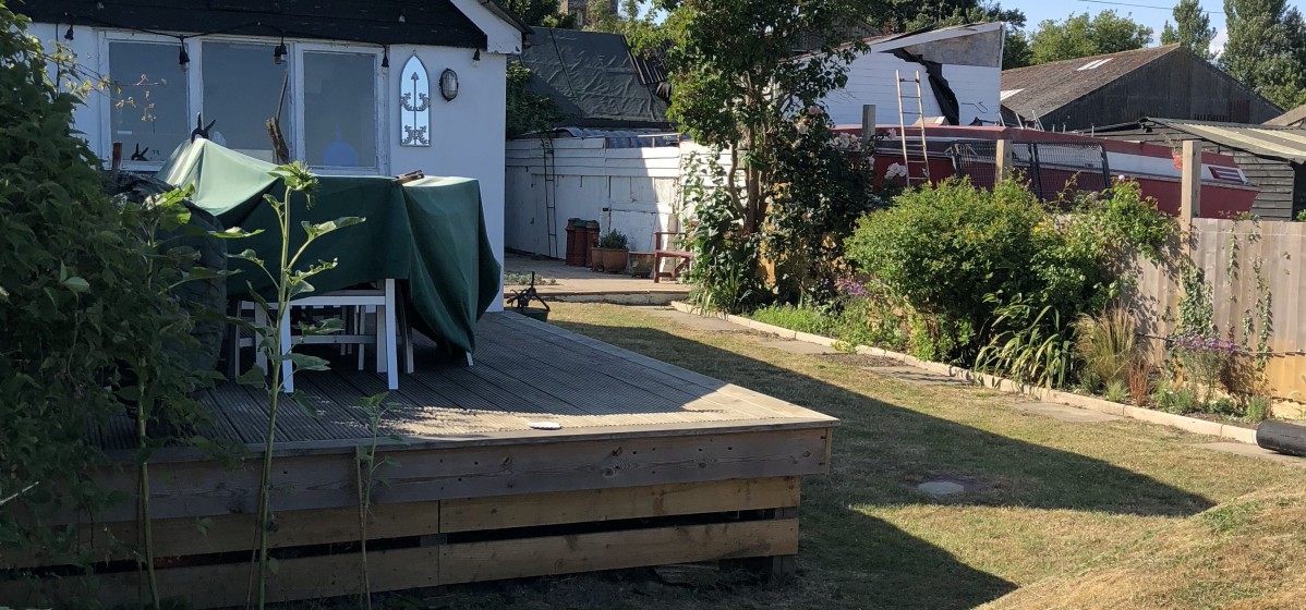 Deck by bank to river